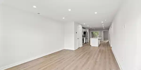 Image 3: Unfurnished living room featuring recessed lightin