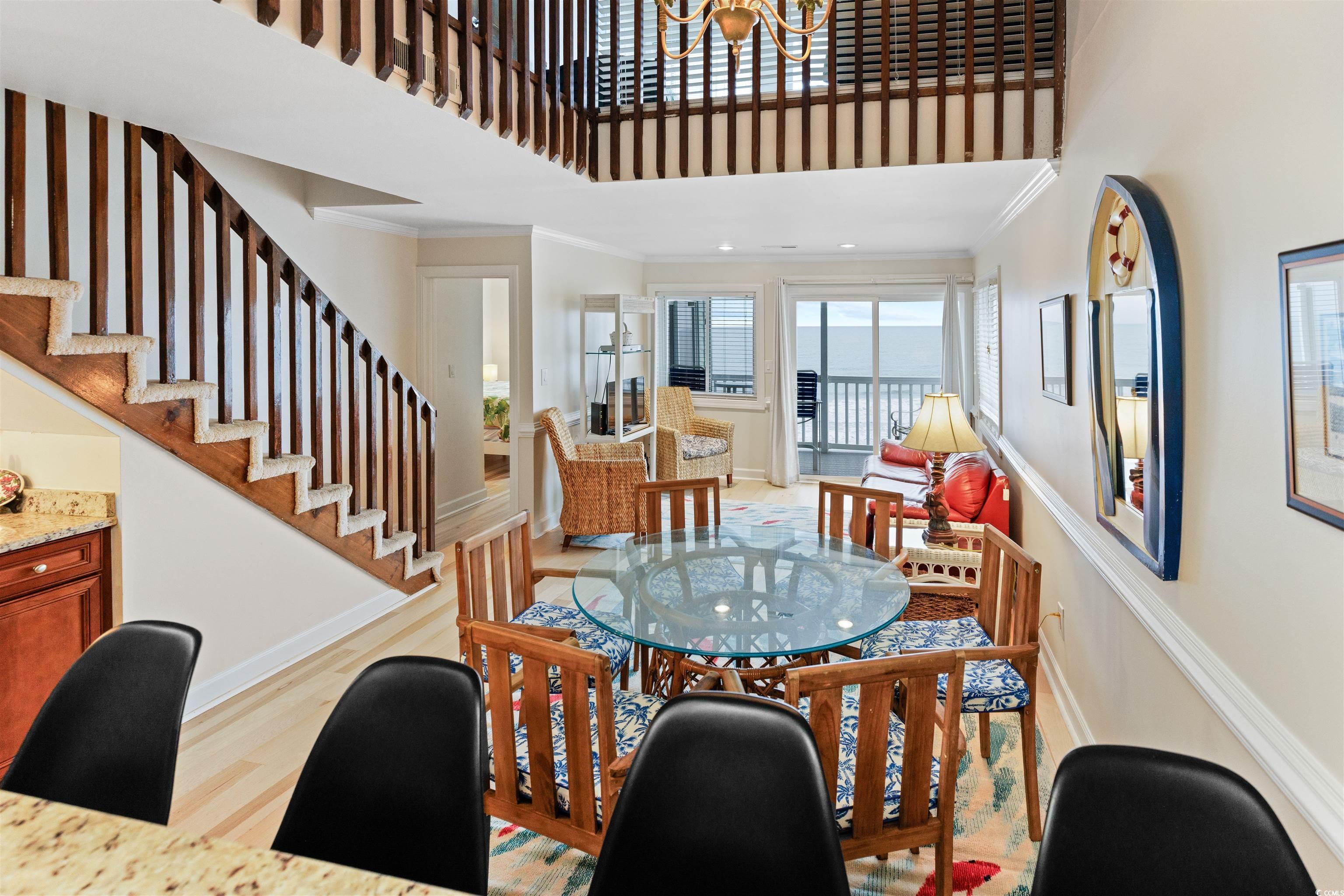 Image 4: Dining space featuring ornamental molding, a tower Image 4: Dining space featuring ornamental molding, a tower