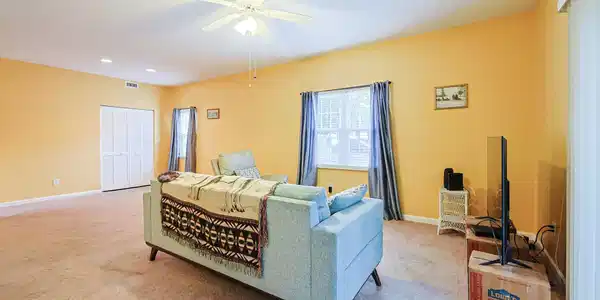 Image 4: Living area with light carpet, a textured ceiling, Image 4: Living area with light carpet, a textured ceiling,