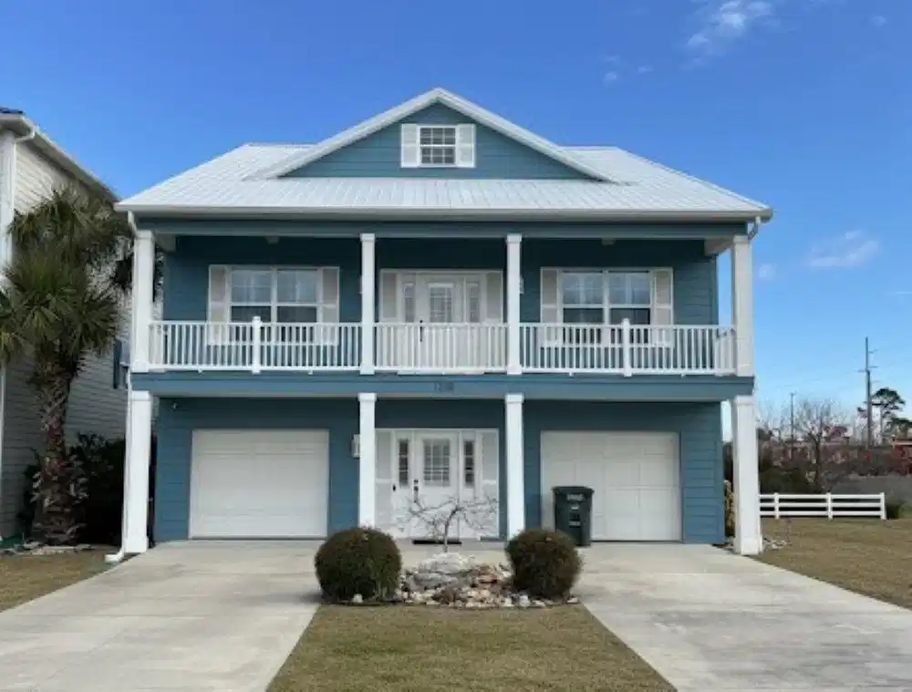 Image 1: Coastal inspired home featuring covered porch, dri Image 1: Coastal inspired home featuring covered porch, dri