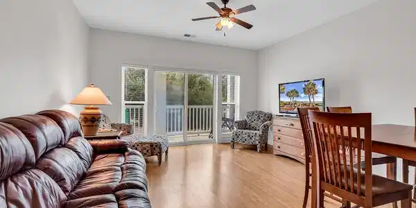 Image 2: Living room featuring light wood-type flooring and