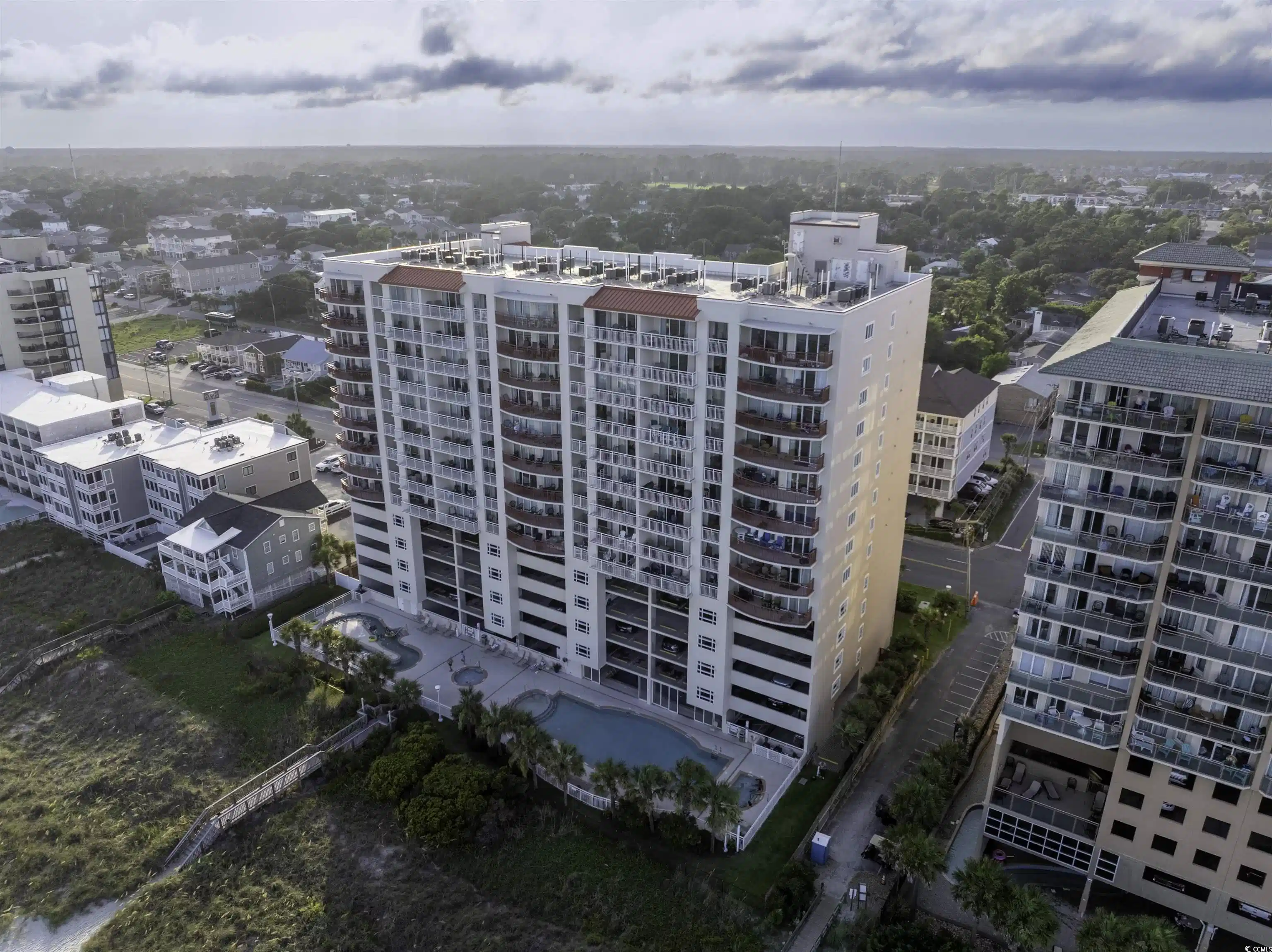 Image 1: Drone / aerial view of apartment complex