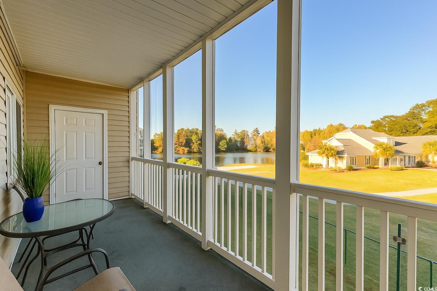 Image 3: Screened Porch with water views of the Pond and In Image 3: Screened Porch with water views of the Pond and In