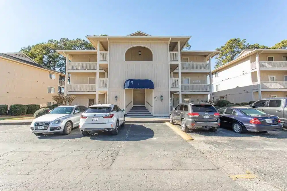 Image 1: View of apartment building / complex featuring unc