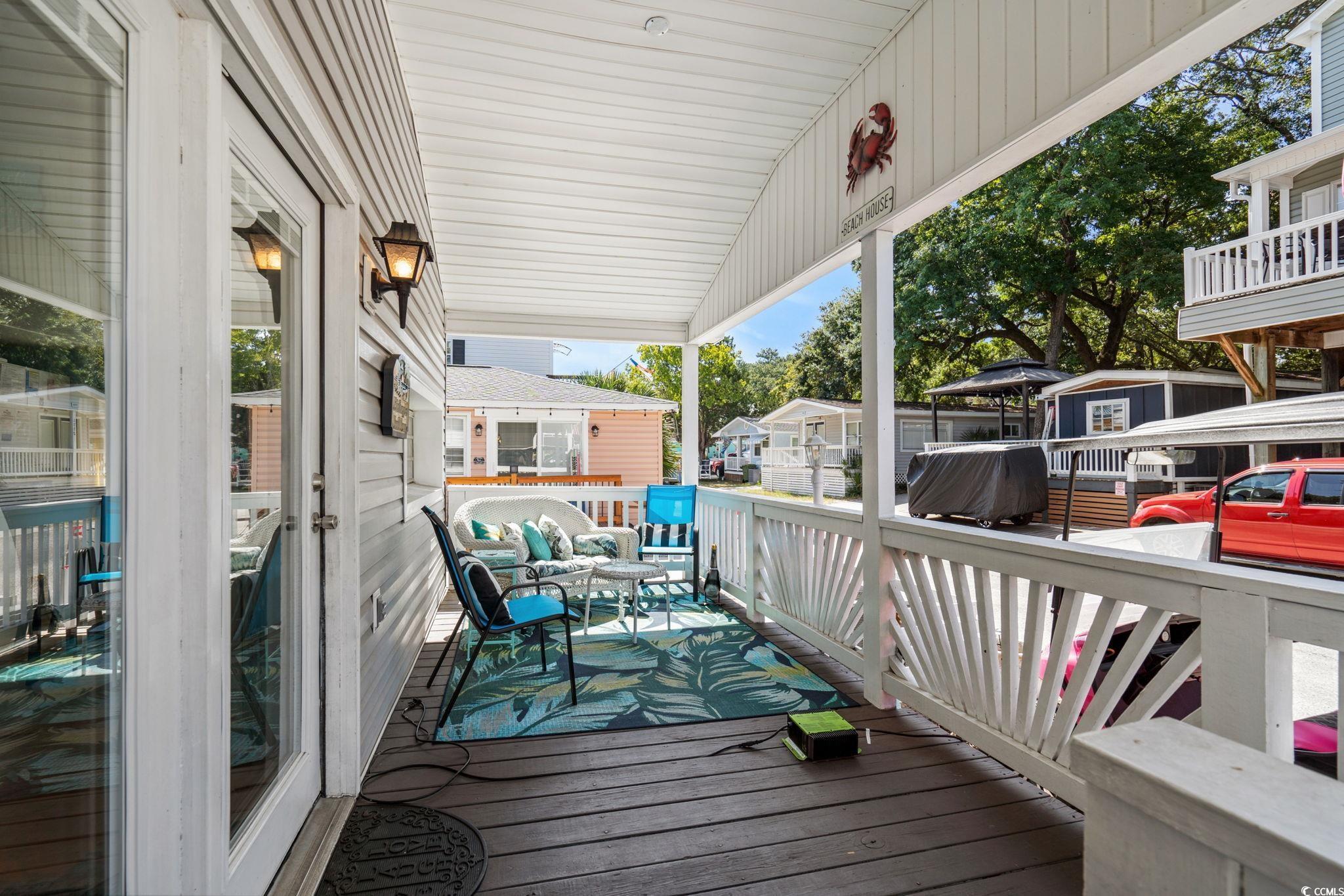 Image 4: Wooden porch with grilling area Image 4: Wooden porch with grilling area
