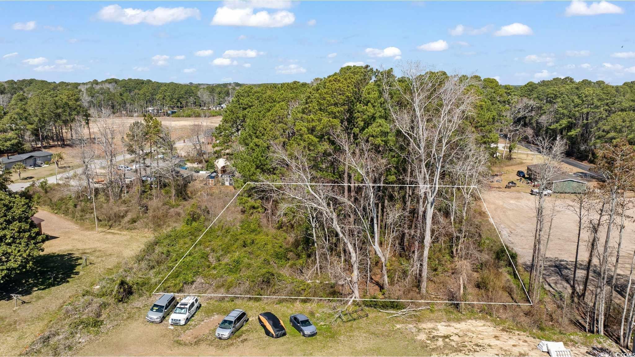 Image 3: Drone / aerial view featuring a wooded view