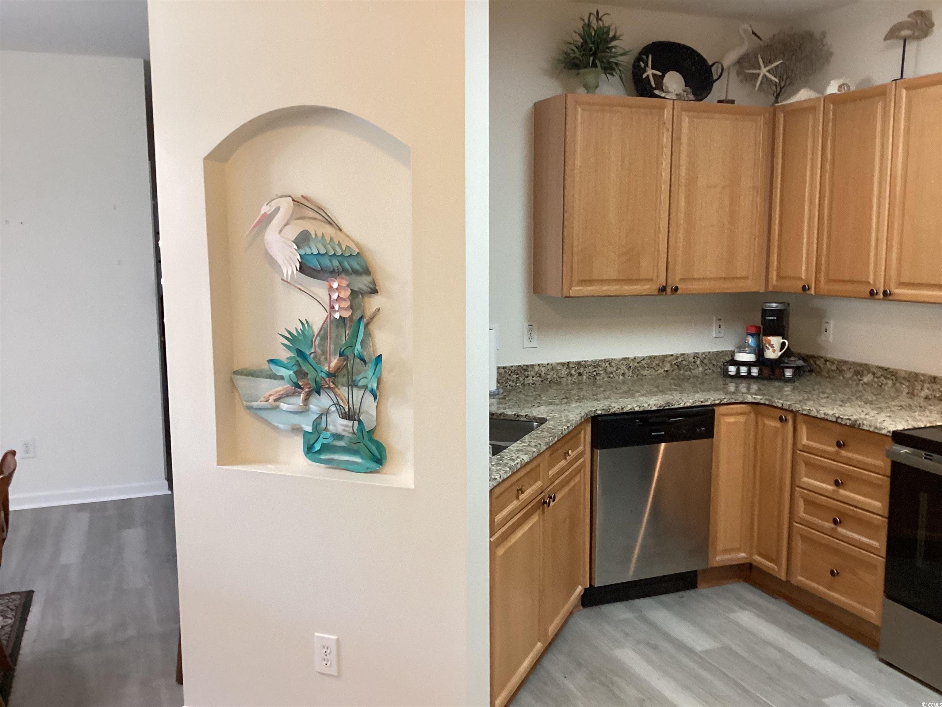 Image 4: Kitchen featuring light wood-style floors, light s Image 4: Kitchen featuring light wood-style floors, light s