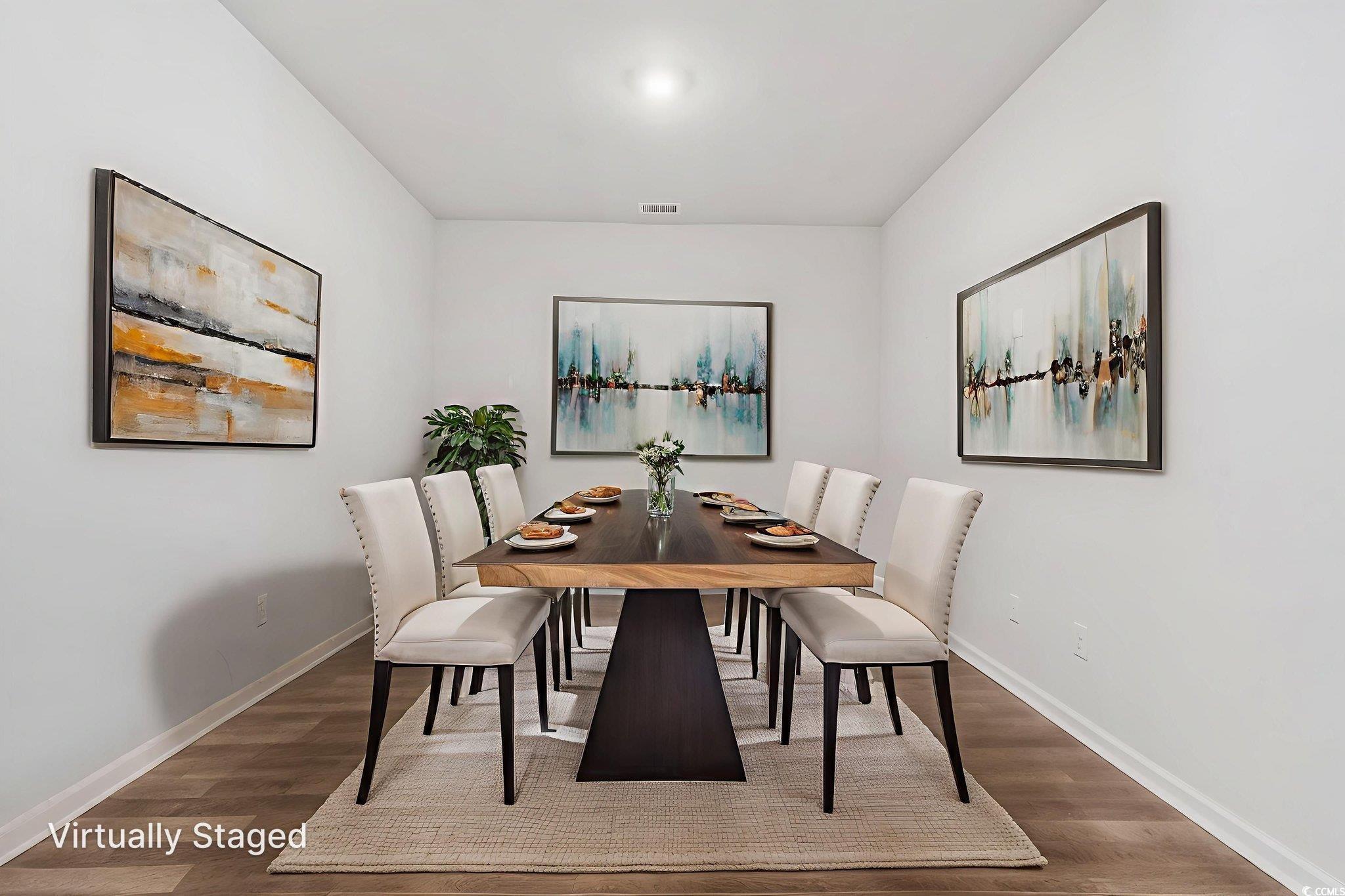 Image 3: Dining space featuring wood finished floors Image 3: Dining space featuring wood finished floors