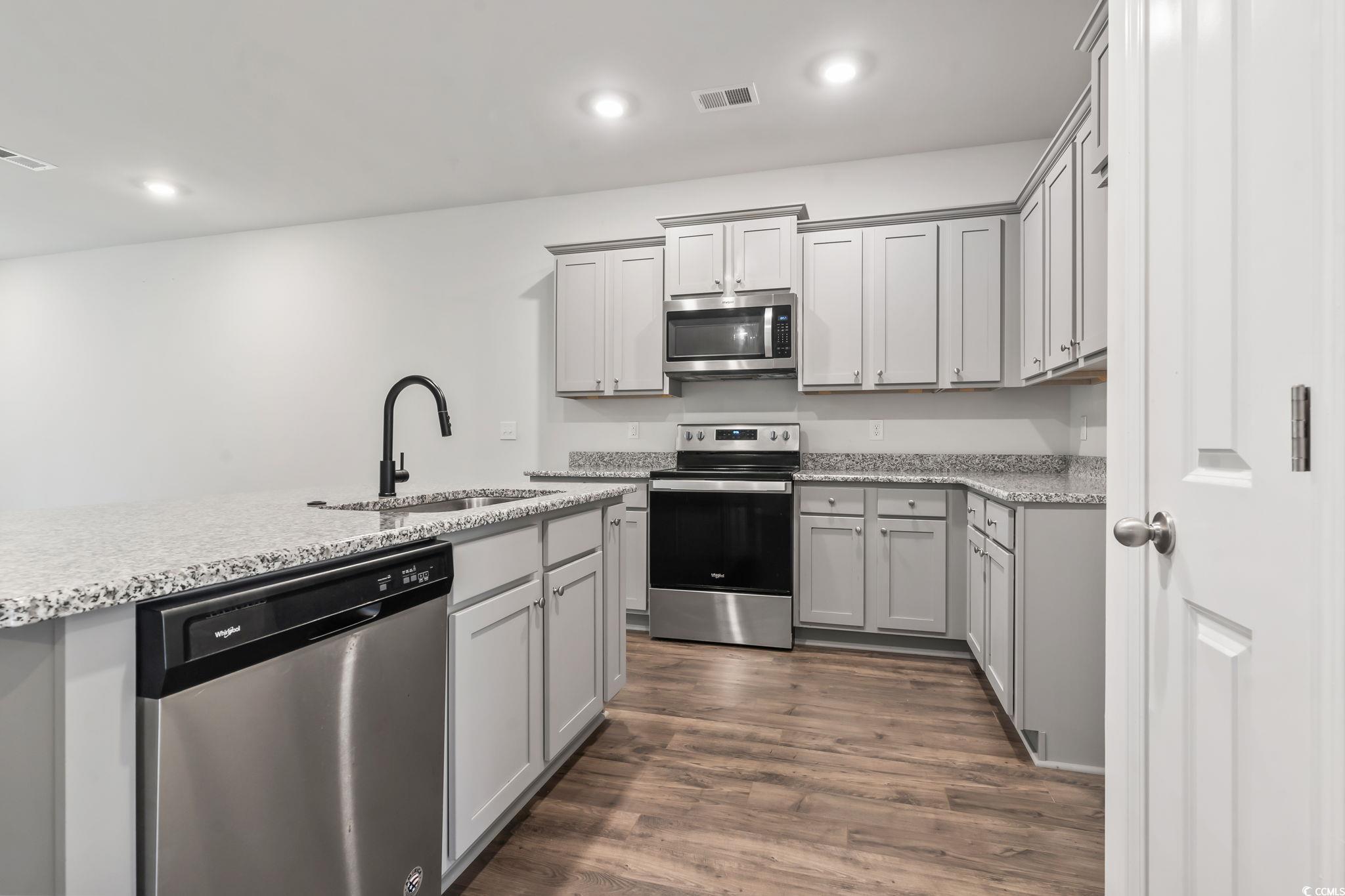Image 4: Kitchen featuring appliances with stainless steel Image 4: Kitchen featuring appliances with stainless steel