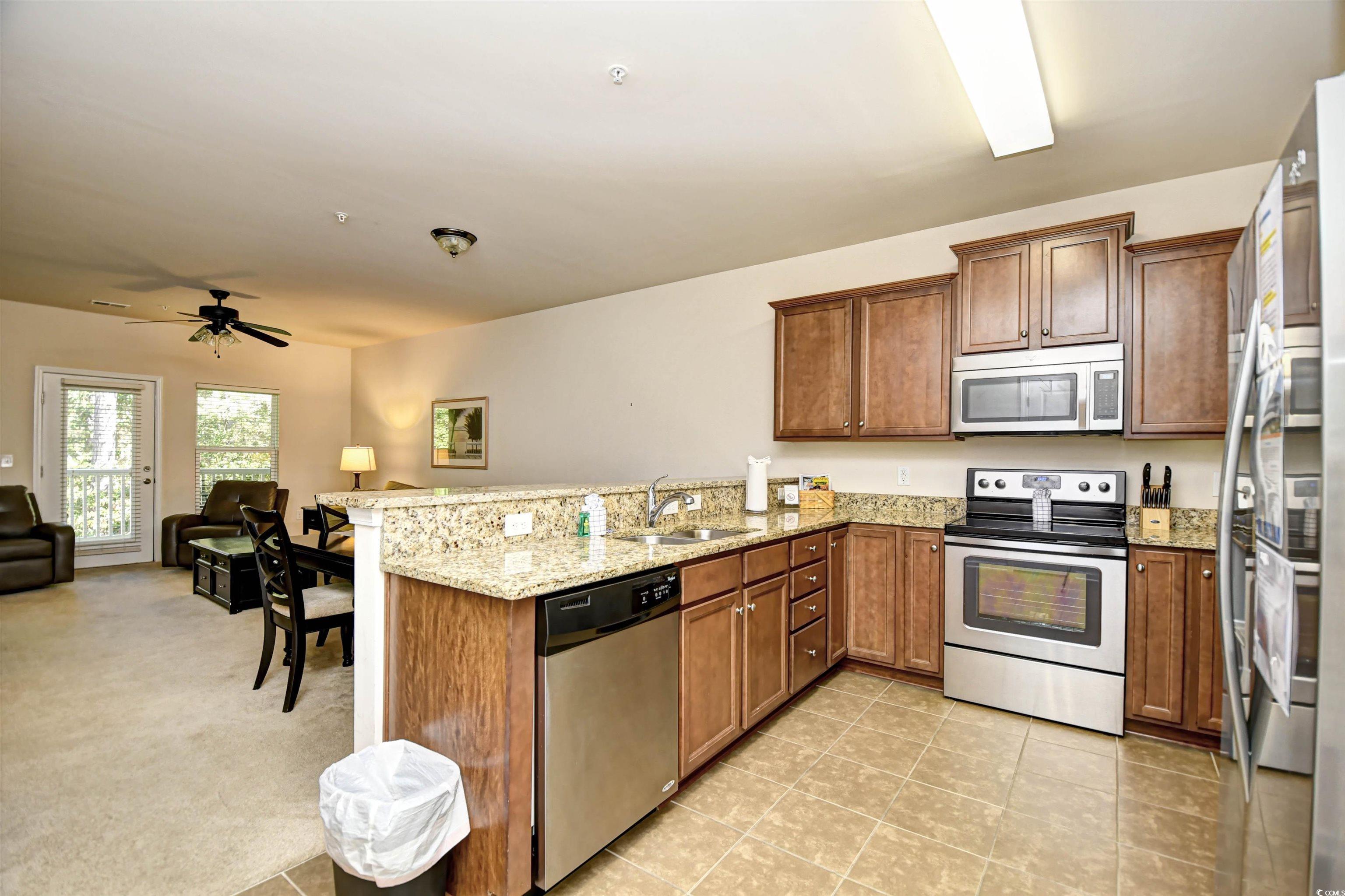 Image 4: Kitchen featuring appliances with stainless steel Image 4: Kitchen featuring appliances with stainless steel