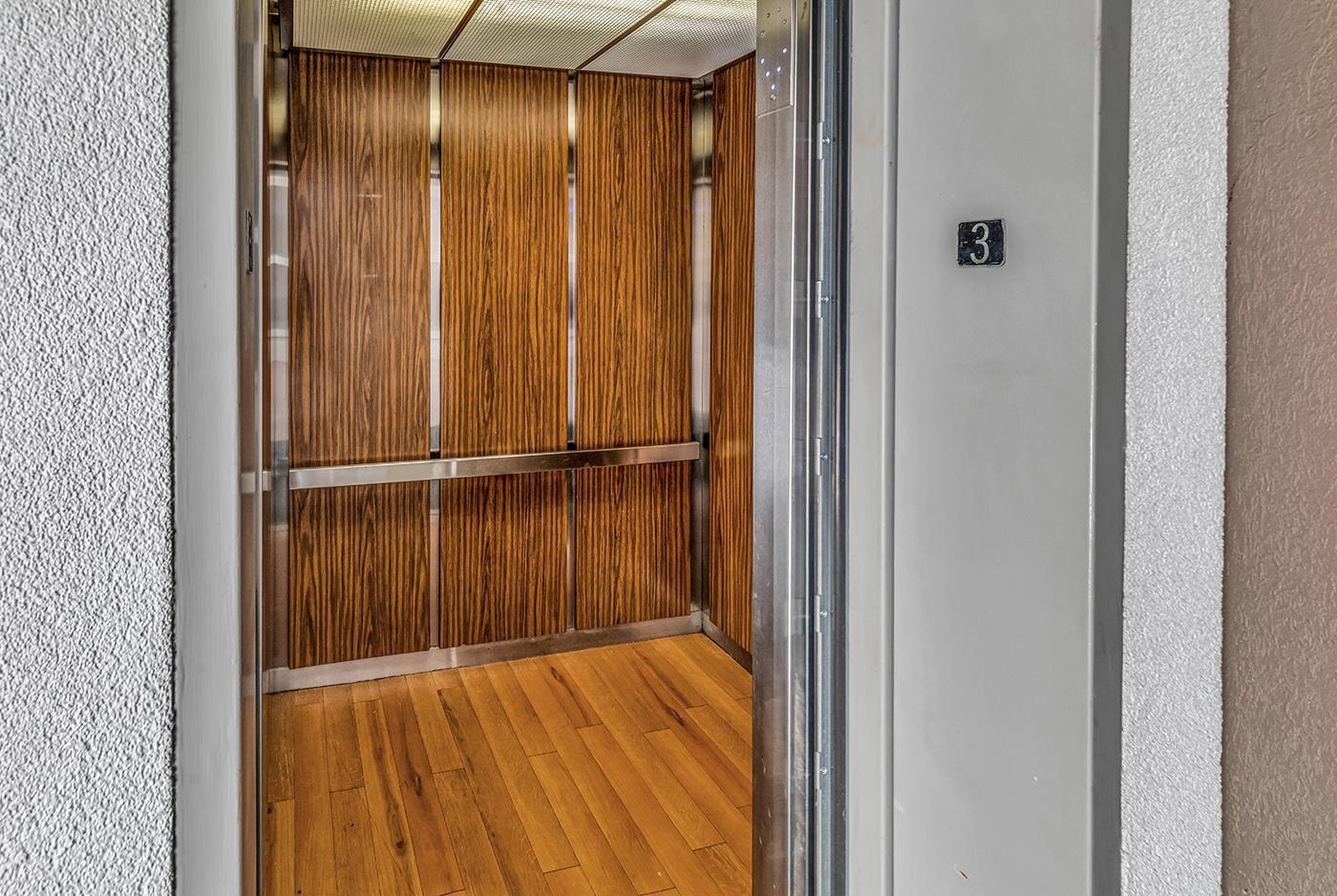 Image 2: Elevator with wood finished floors Image 2: Elevator with wood finished floors