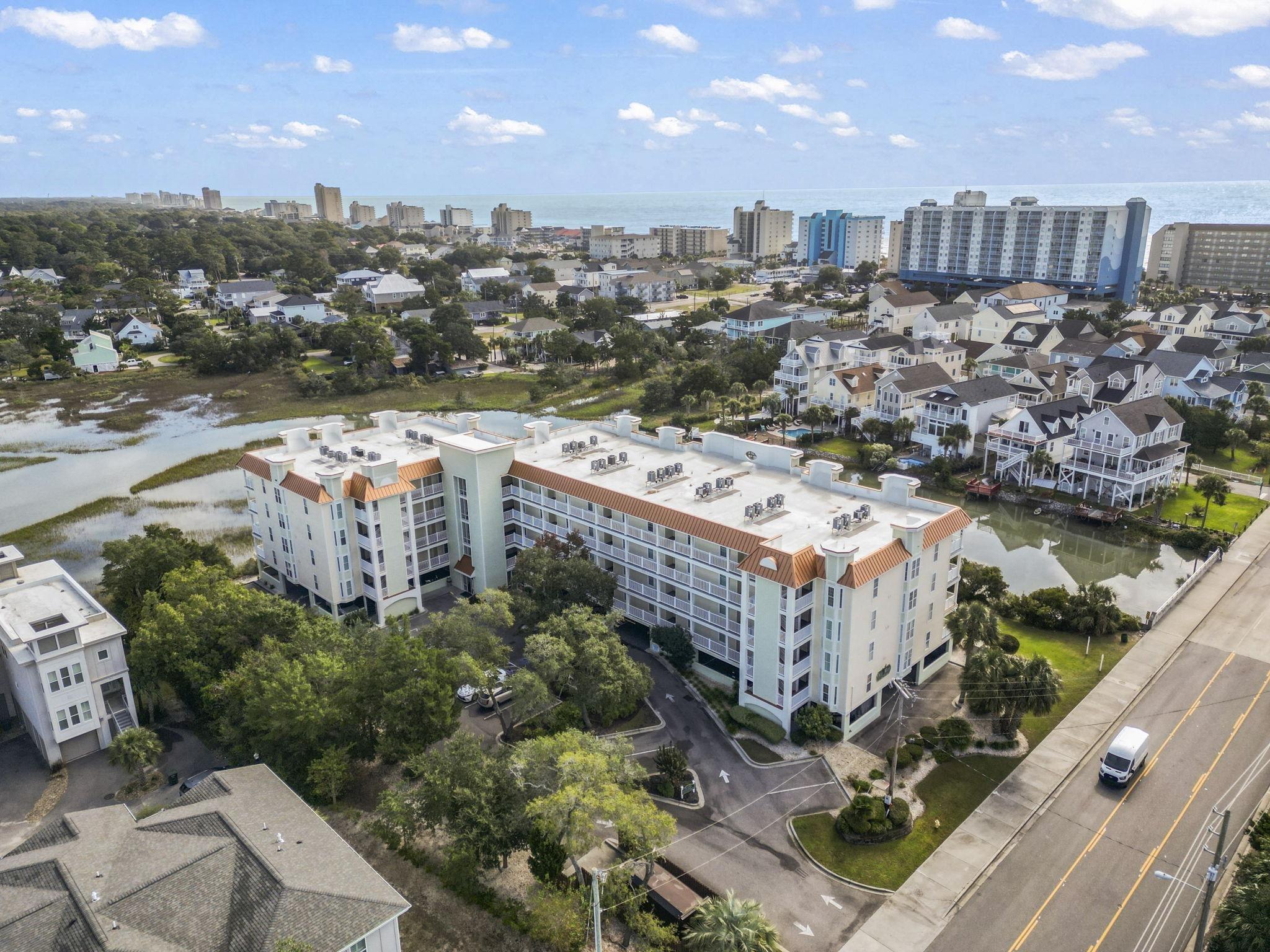 Image 3: Drone / aerial view of city skyline and apartment