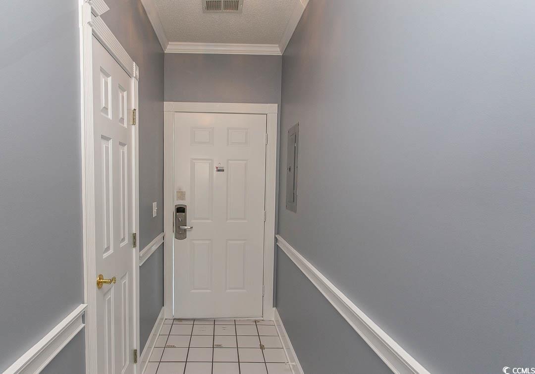 Image 3: Doorway to outside with a textured ceiling, basebo Image 3: Doorway to outside with a textured ceiling, basebo