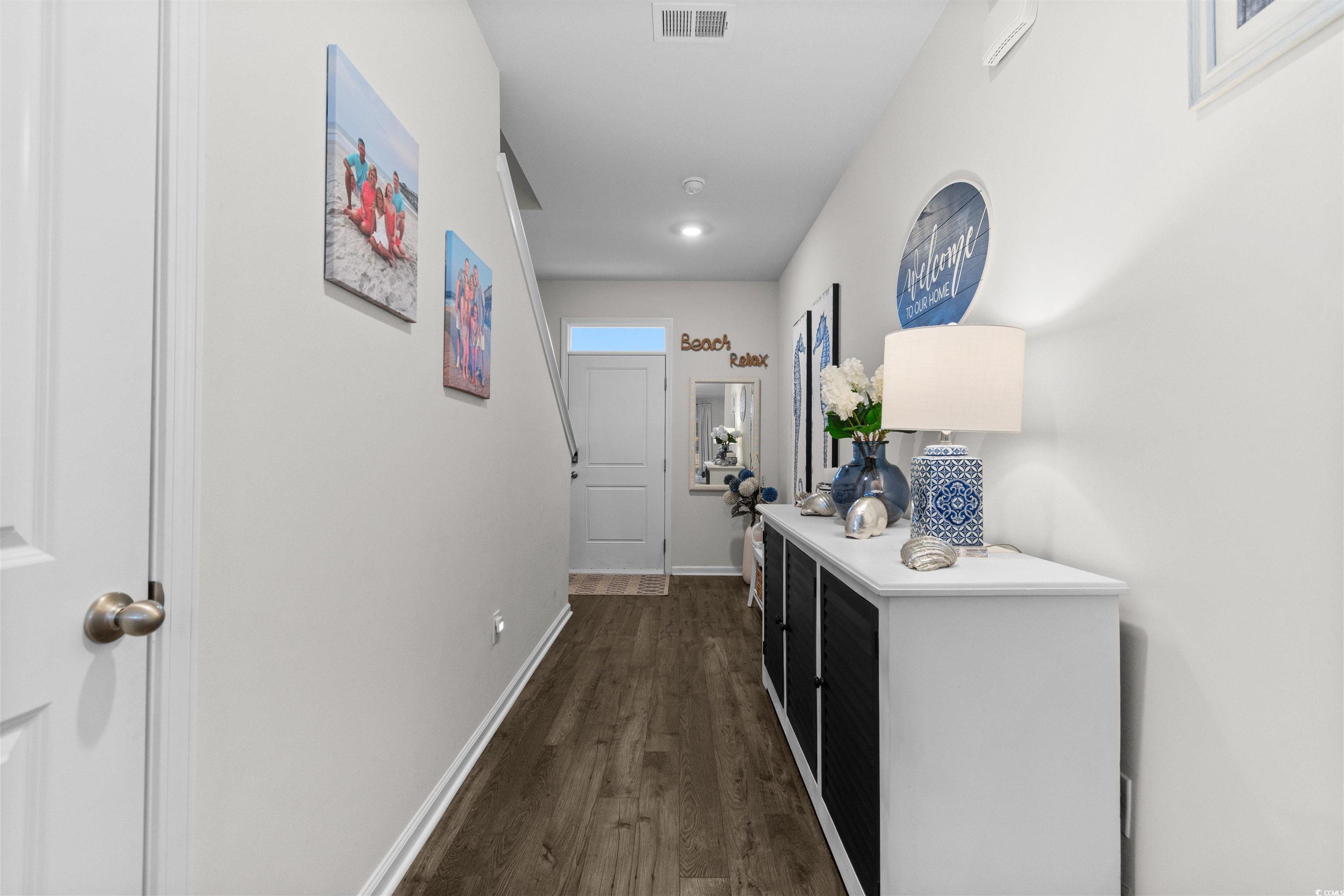 Image 3: Hallway featuring dark wood-style flooring and rec