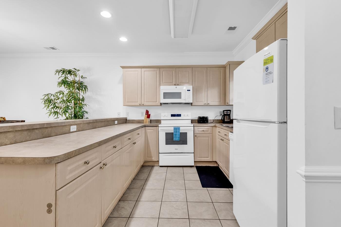 Image 3: Kitchen featuring crown molding, white appliances, Image 3: Kitchen featuring crown molding, white appliances,