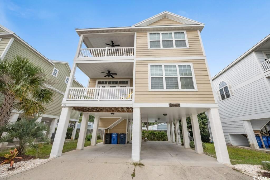 Image 1: View of front of property with a carport, ceiling Image 1: View of front of property with a carport, ceiling