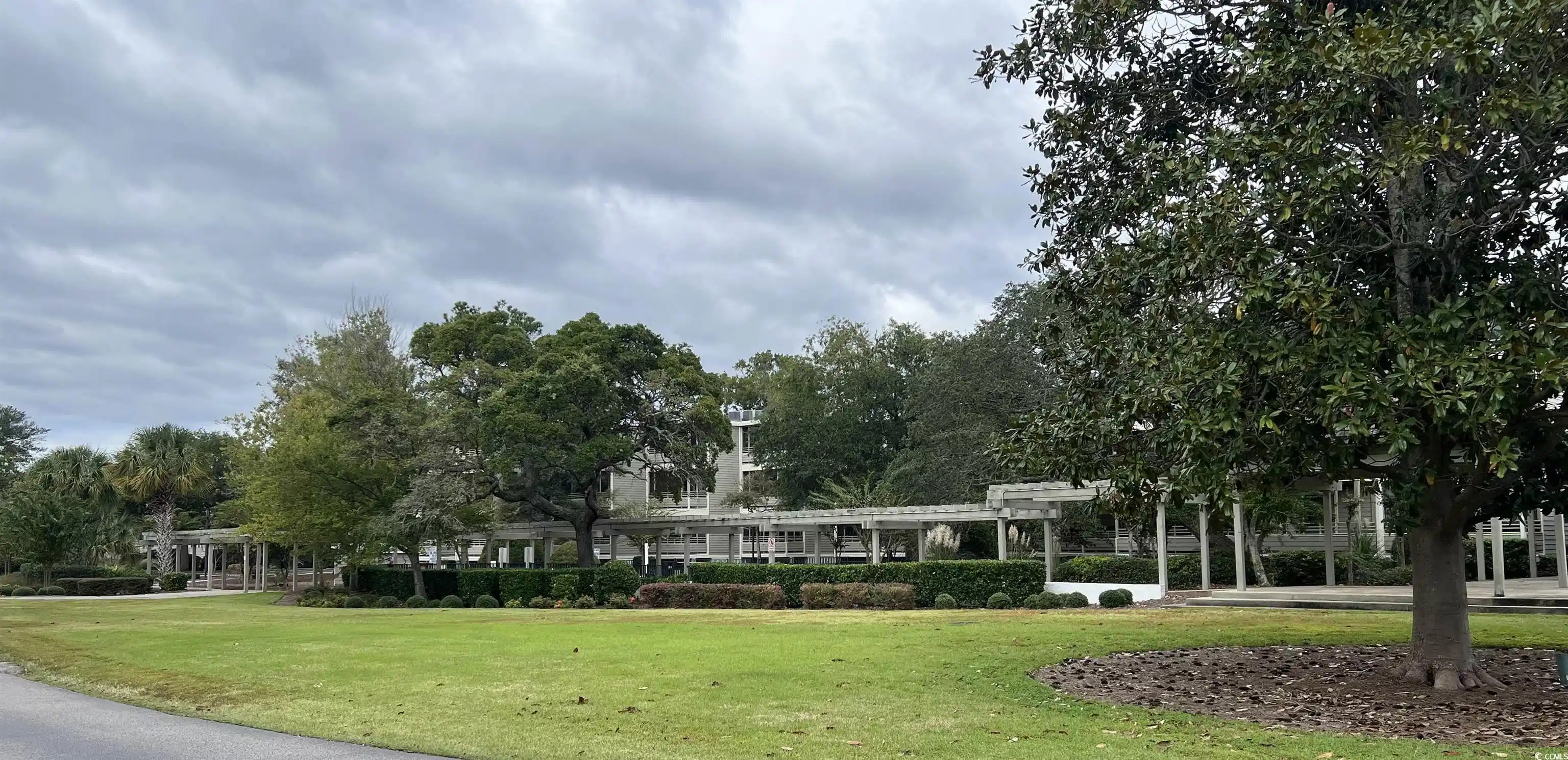 Image 1: Surrounding community with a lawn Image 1: Surrounding community with a lawn