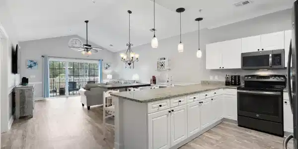 Image 3: Kitchen featuring black appliances, a chandelier, Image 3: Kitchen featuring black appliances, a chandelier,
