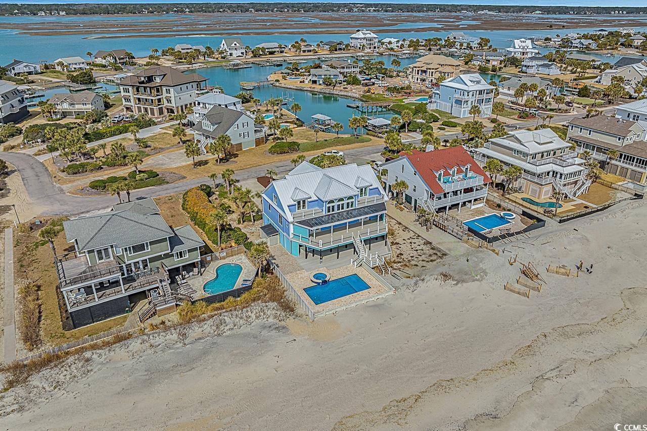 Image 2: Bird's eye view featuring a water view and a resid