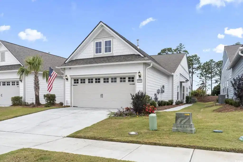 Image 1: View of front of property featuring roof with shin Image 1: View of front of property featuring roof with shin