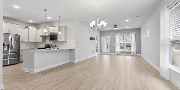 Image 2: Open floor plan, decorative light fixtures, a chan Image 2: Open floor plan, decorative light fixtures, a chan
