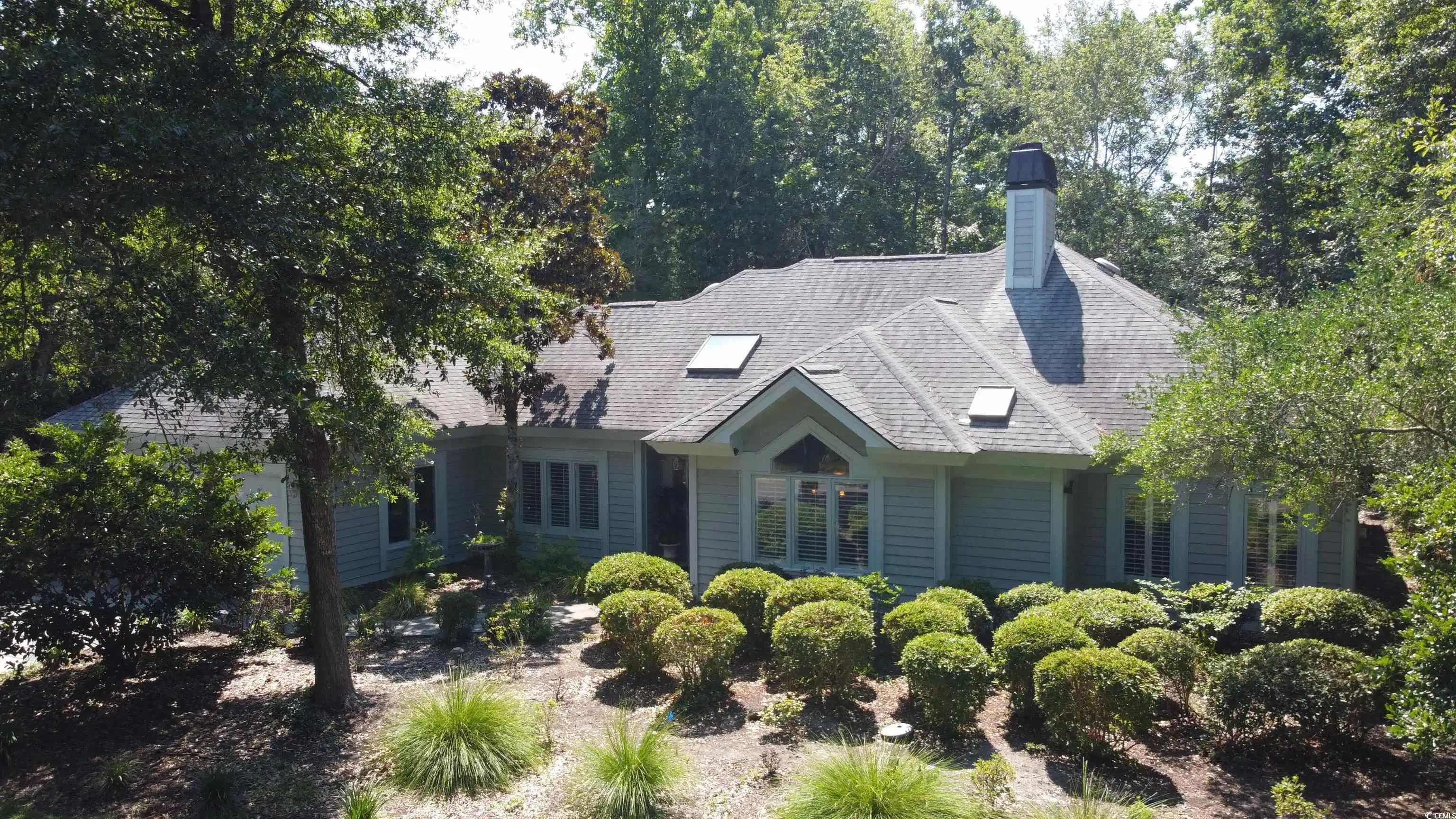 Image 1: View of front of home featuring a chimney Image 1: View of front of home featuring a chimney
