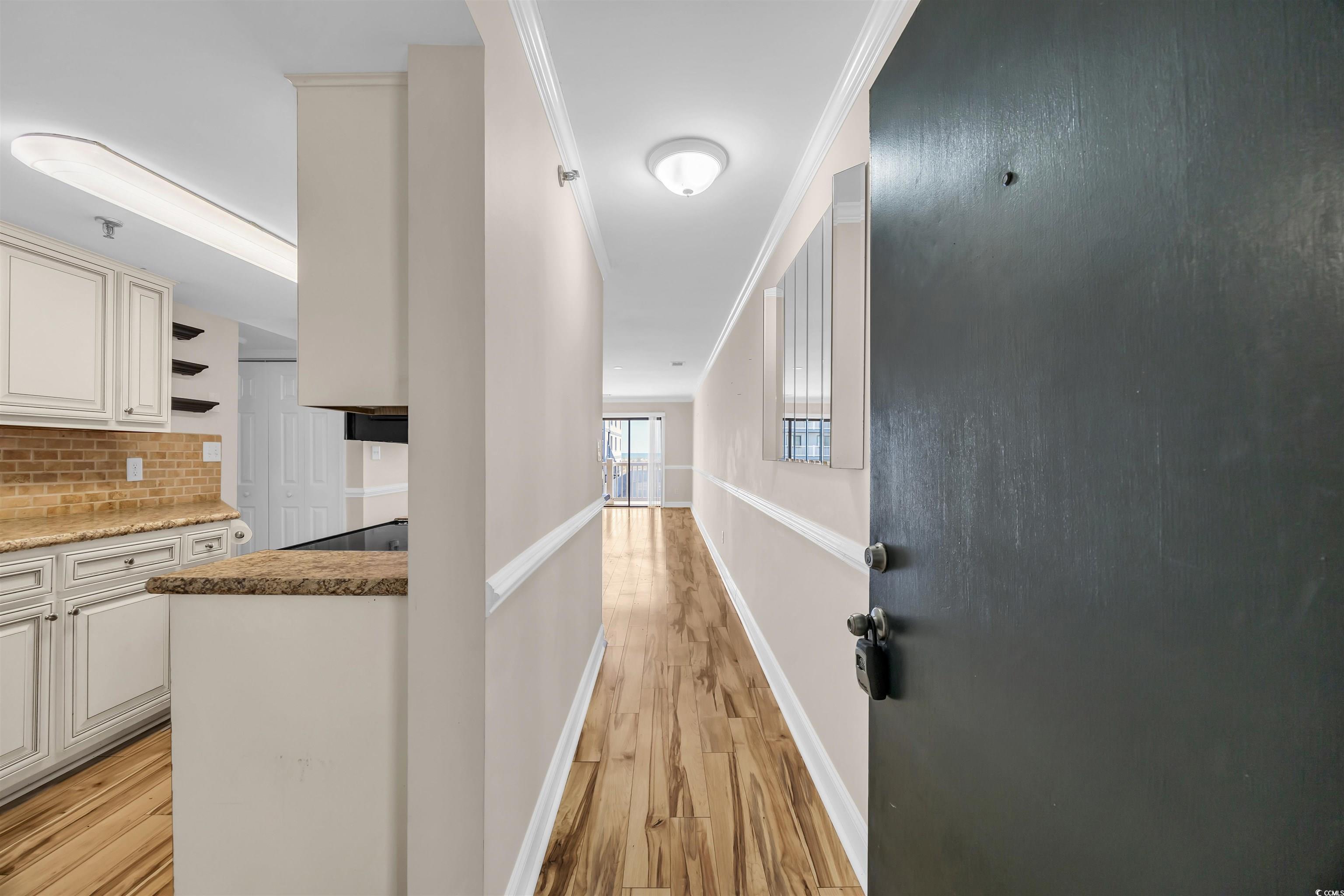 Image 2: Hallway featuring baseboards, ornamental molding, Image 2: Hallway featuring baseboards, ornamental molding,