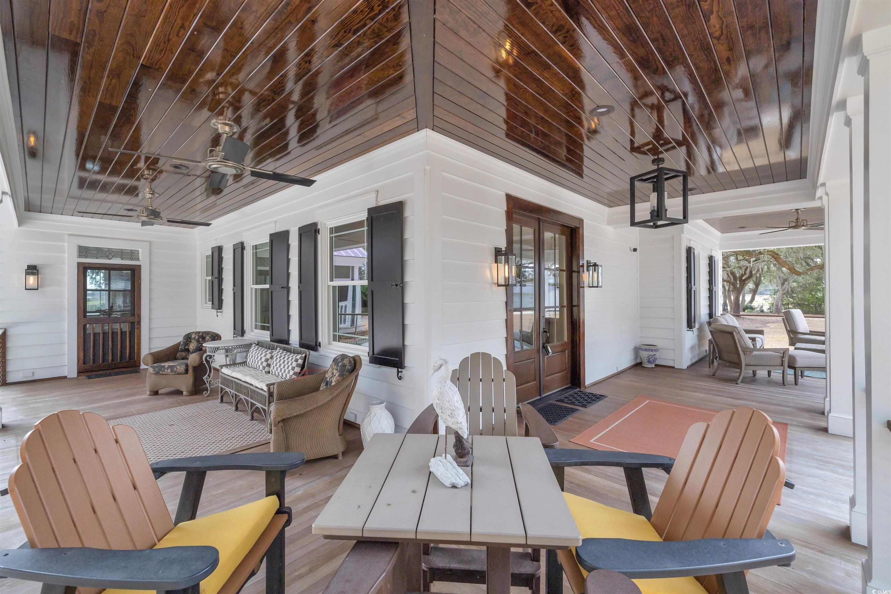 Image 4: Front porch featuring outdoor lounge area, ceiling