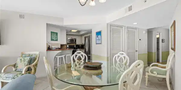 Image 3: Dining room featuring light tile patterned floors,