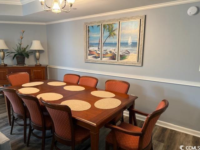Image 4: Dining room featuring ornamental molding, a chande