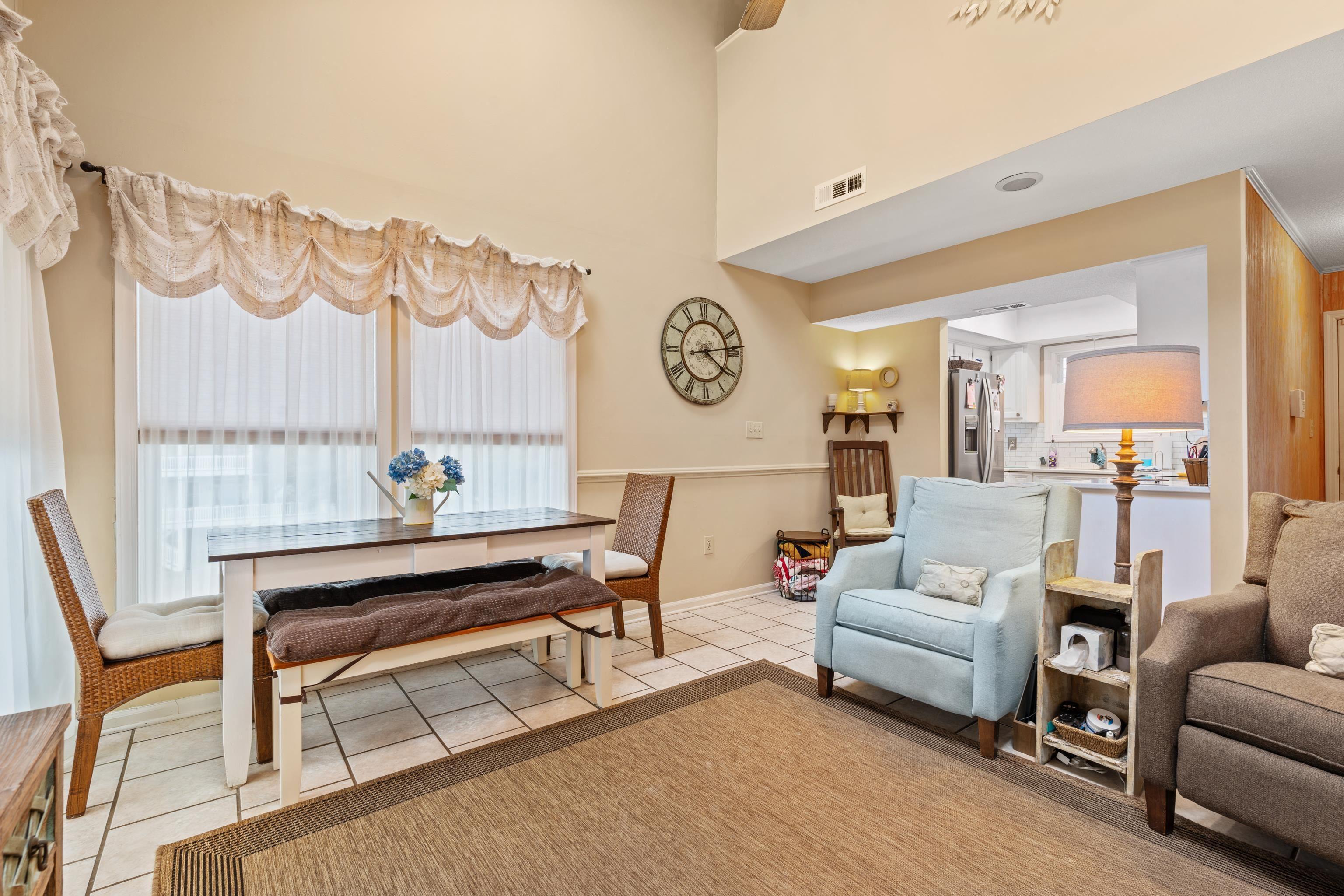 Image 4: Dining space with light tile patterned floors, a t Image 4: Dining space with light tile patterned floors, a t