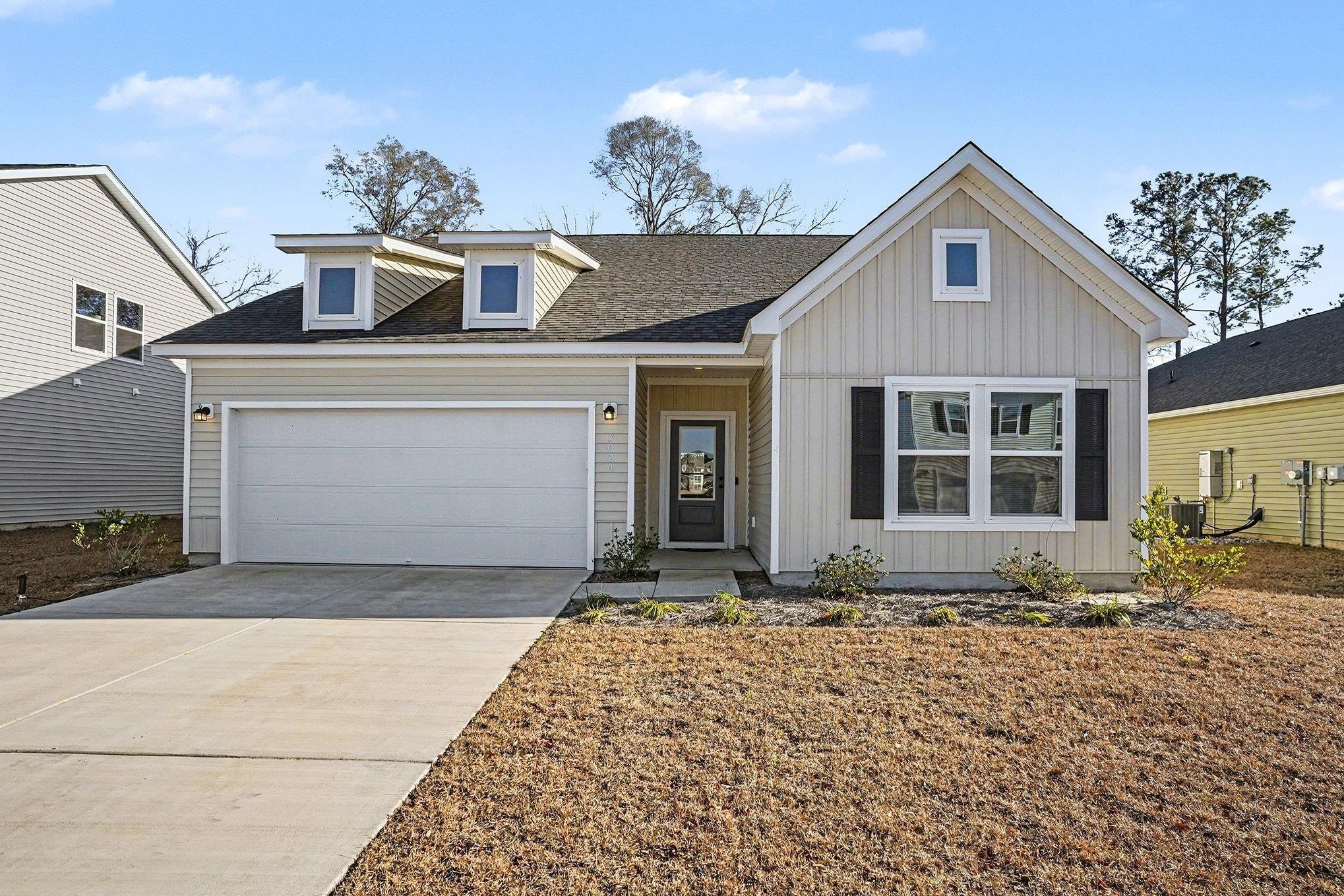 Image 2: View of front of property featuring driveway, a sh Image 2: View of front of property featuring driveway, a sh