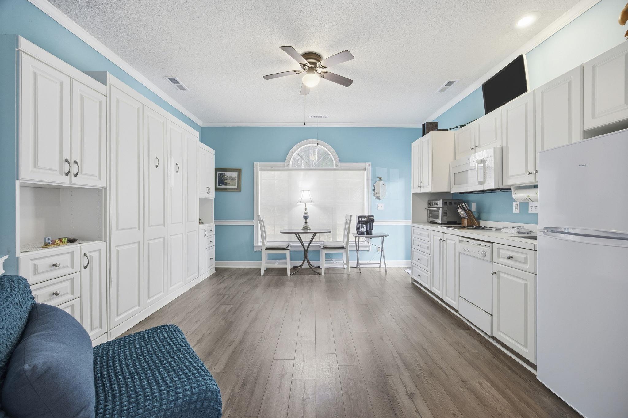 Image 4: View from front door with Murphy Bed system uprigh