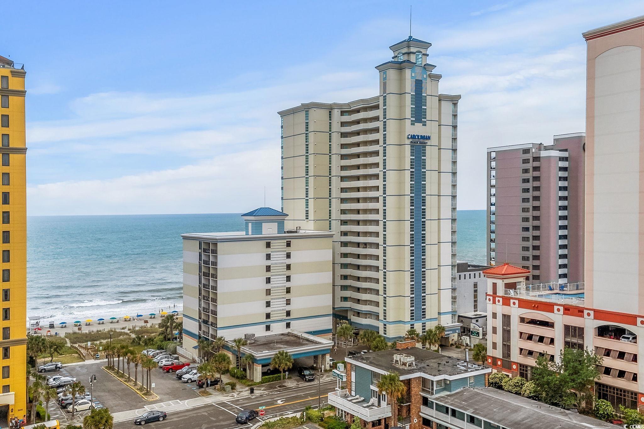 Image 1: View of property featuring a water view Image 1: View of property featuring a water view