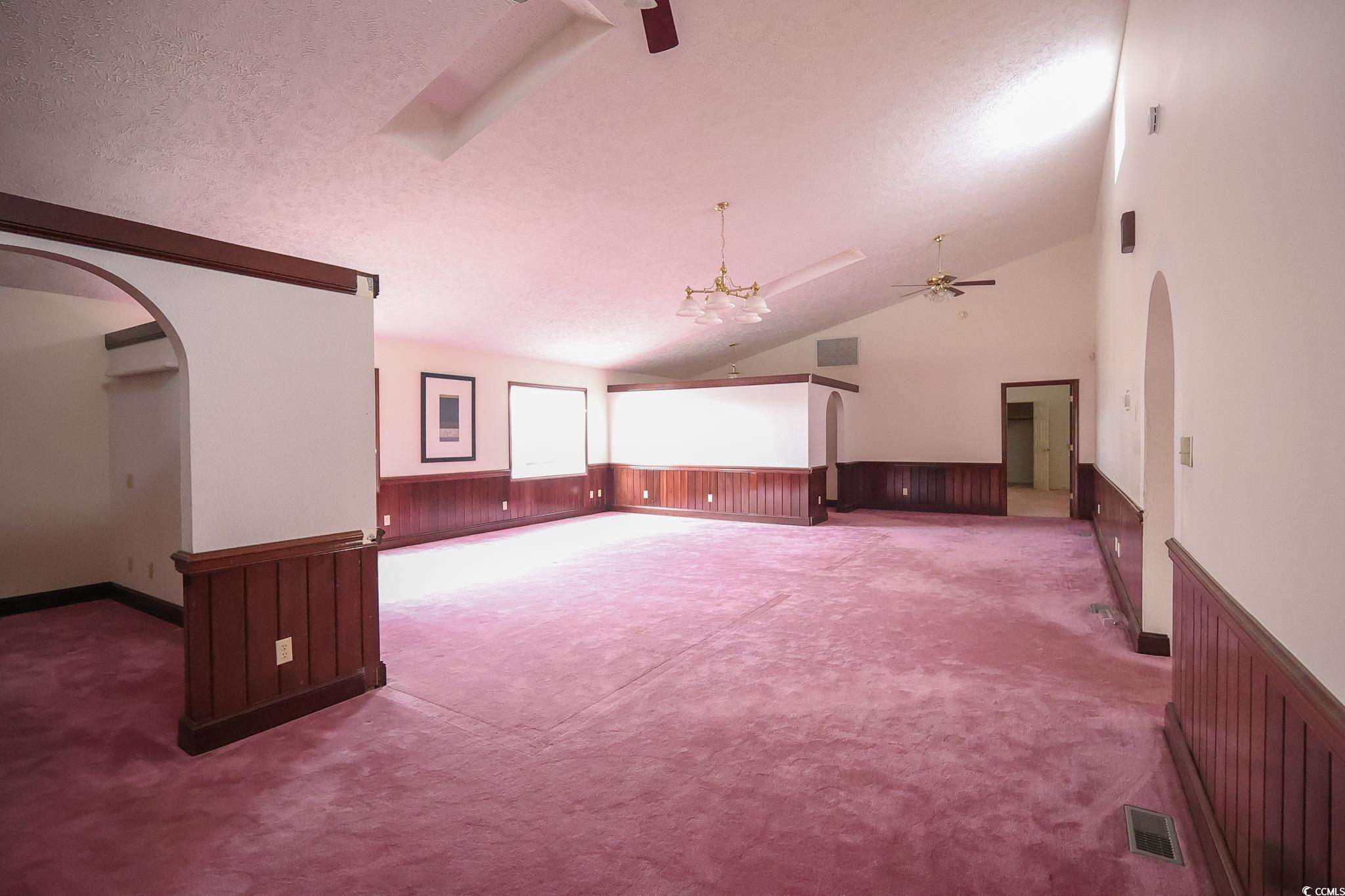 Image 4: Interior space with carpet flooring, wooden walls, Image 4: Interior space with carpet flooring, wooden walls,