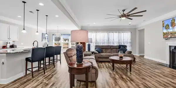 Image 4: Living room featuring crown molding, a chandelier, Image 4: Living room featuring crown molding, a chandelier,