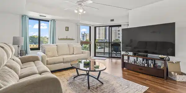 Image 2: Super Bright Living Room with Floor to Ceiling Gla