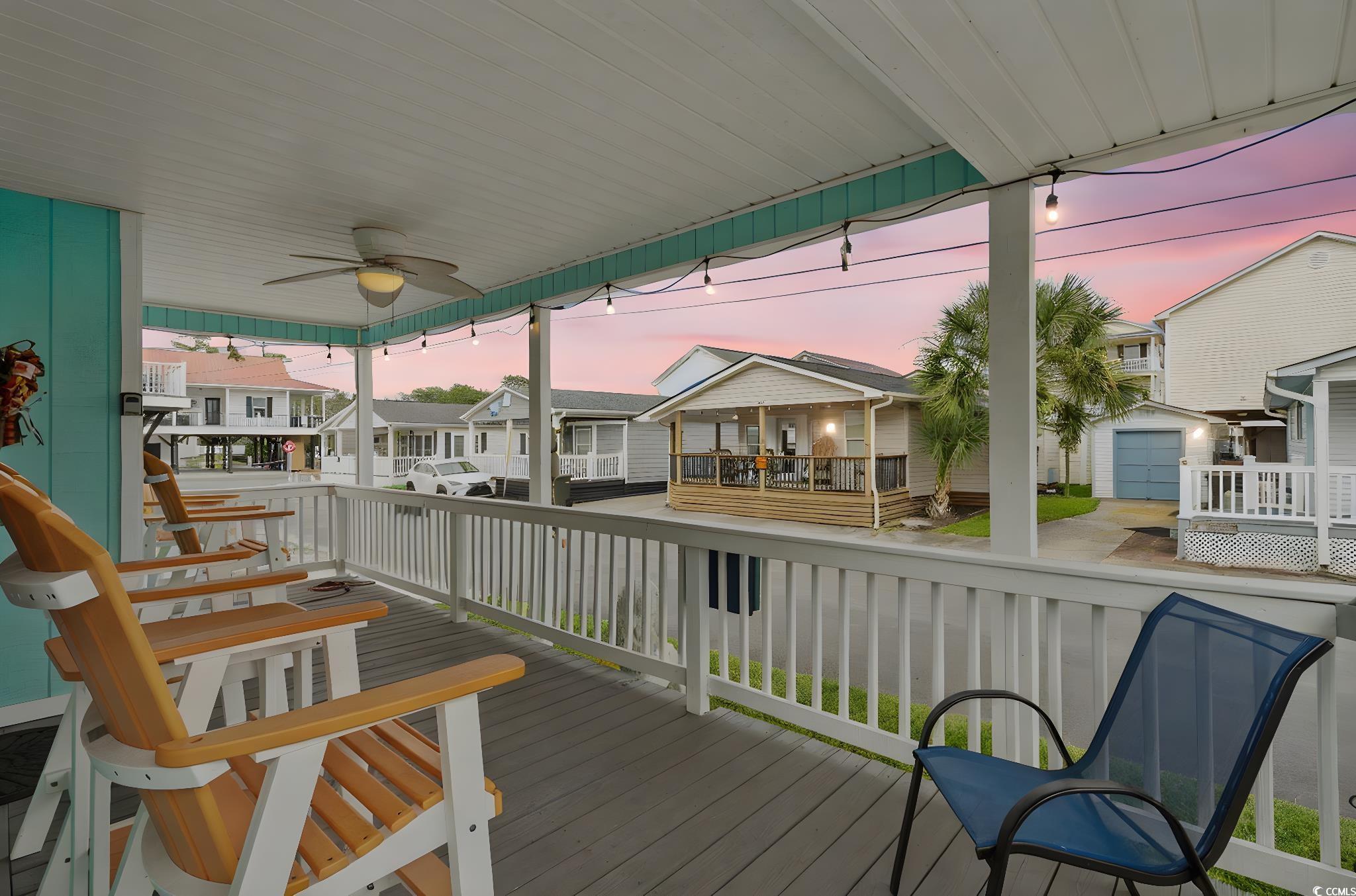 Image 2: Deck featuring a residential view