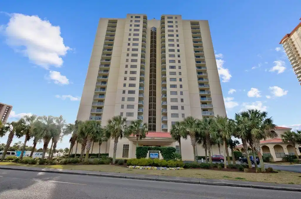 Image 1: View of apartment building / complex