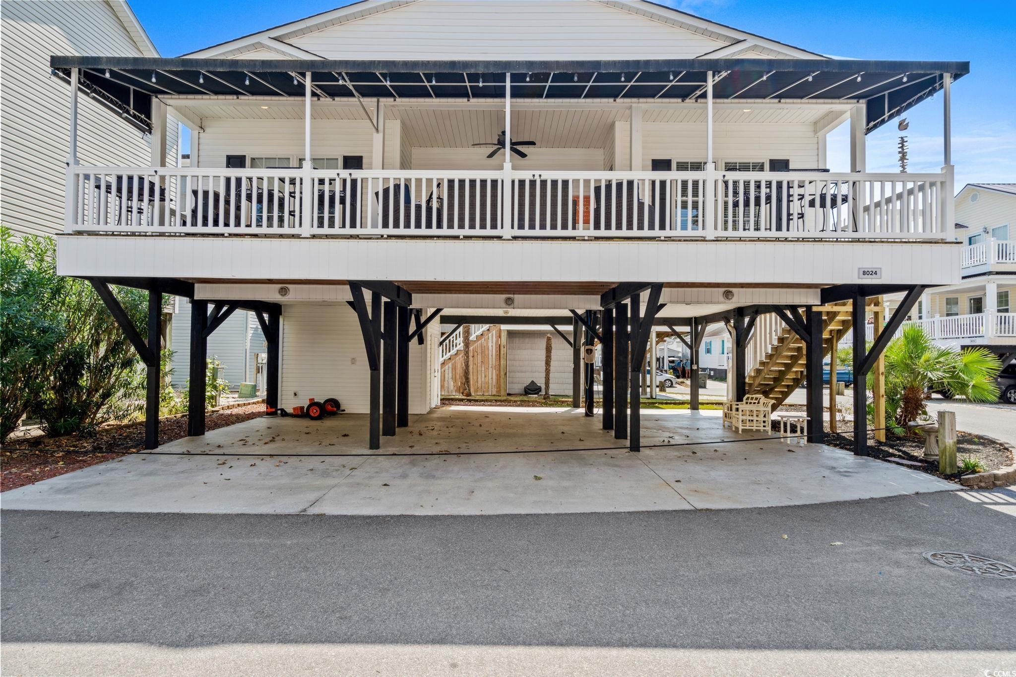 Image 2: View of front of property featuring a carport, a d Image 2: View of front of property featuring a carport, a d