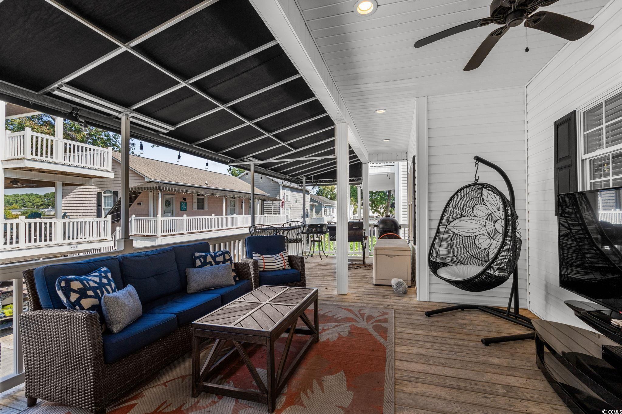Image 4: View of patio with a deck, an outdoor living space Image 4: View of patio with a deck, an outdoor living space