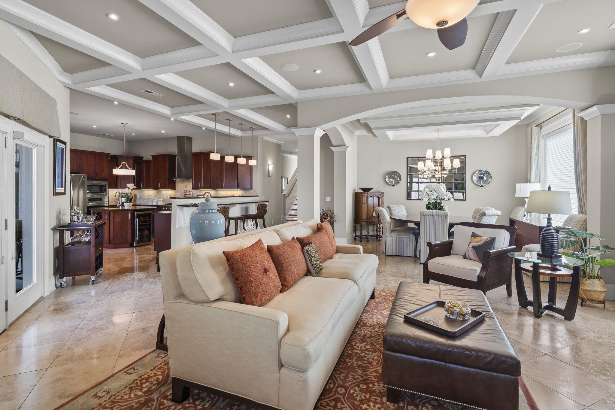 Image 4: Living area featuring decorative columns, a ceilin Image 4: Living area featuring decorative columns, a ceilin