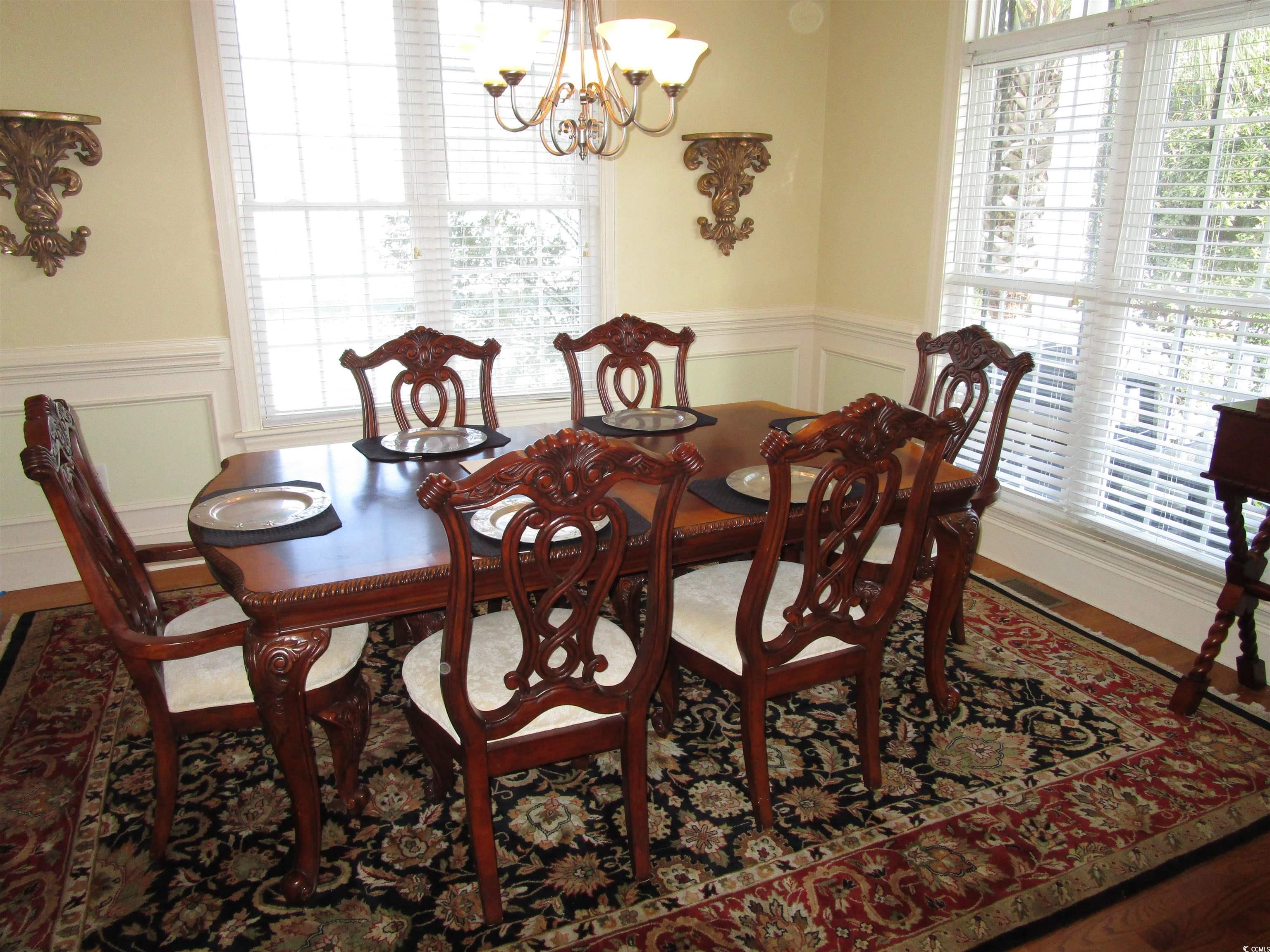 Image 4: Dining space with wainscoting, a decorative wall, Image 4: Dining space with wainscoting, a decorative wall,