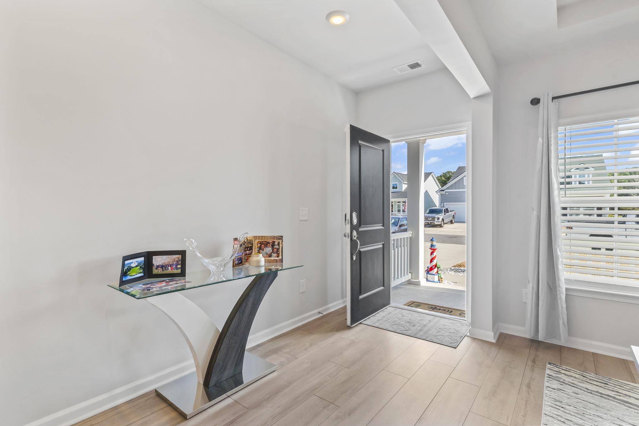Image 2: Entryway with light wood-style floors and recessed Image 2: Entryway with light wood-style floors and recessed