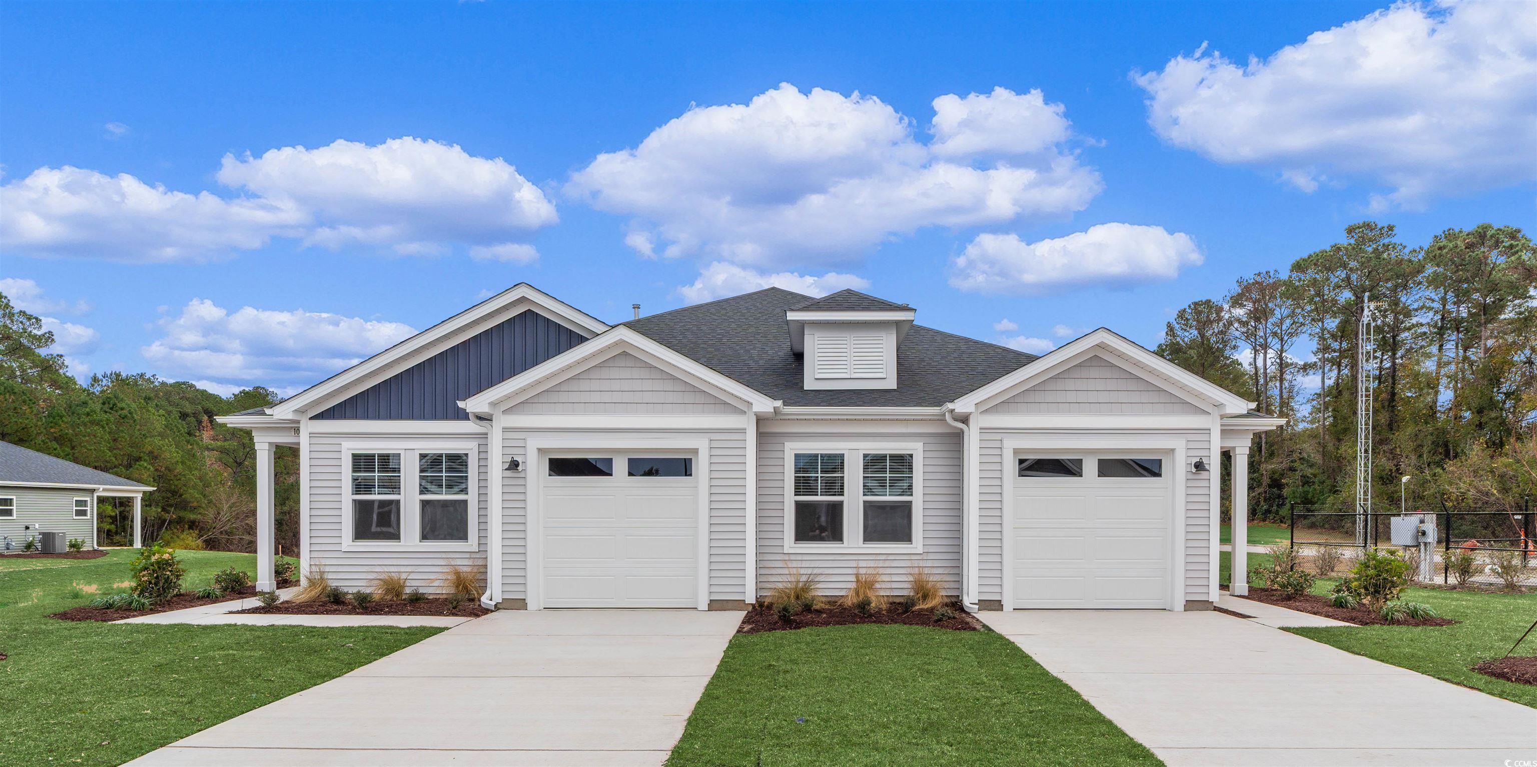 Image 1: View of front of home featuring concrete driveway, Image 1: View of front of home featuring concrete driveway,