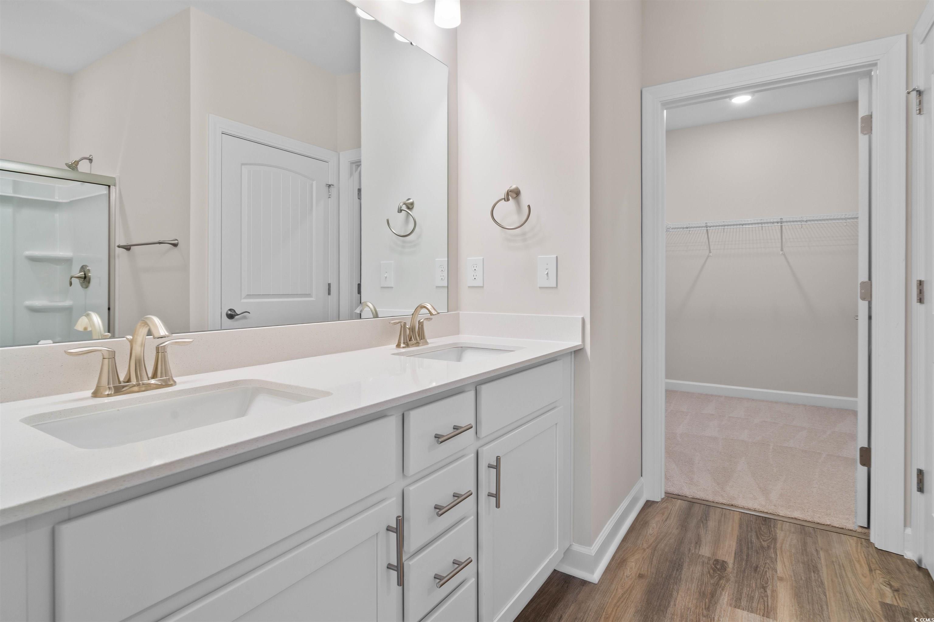 Image 4: Full bathroom with double vanity, dark wood-style Image 4: Full bathroom with double vanity, dark wood-style
