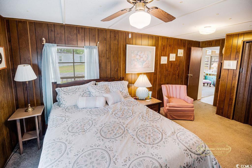 Image 4: Carpeted bedroom featuring ceiling fan and wooden Image 4: Carpeted bedroom featuring ceiling fan and wooden
