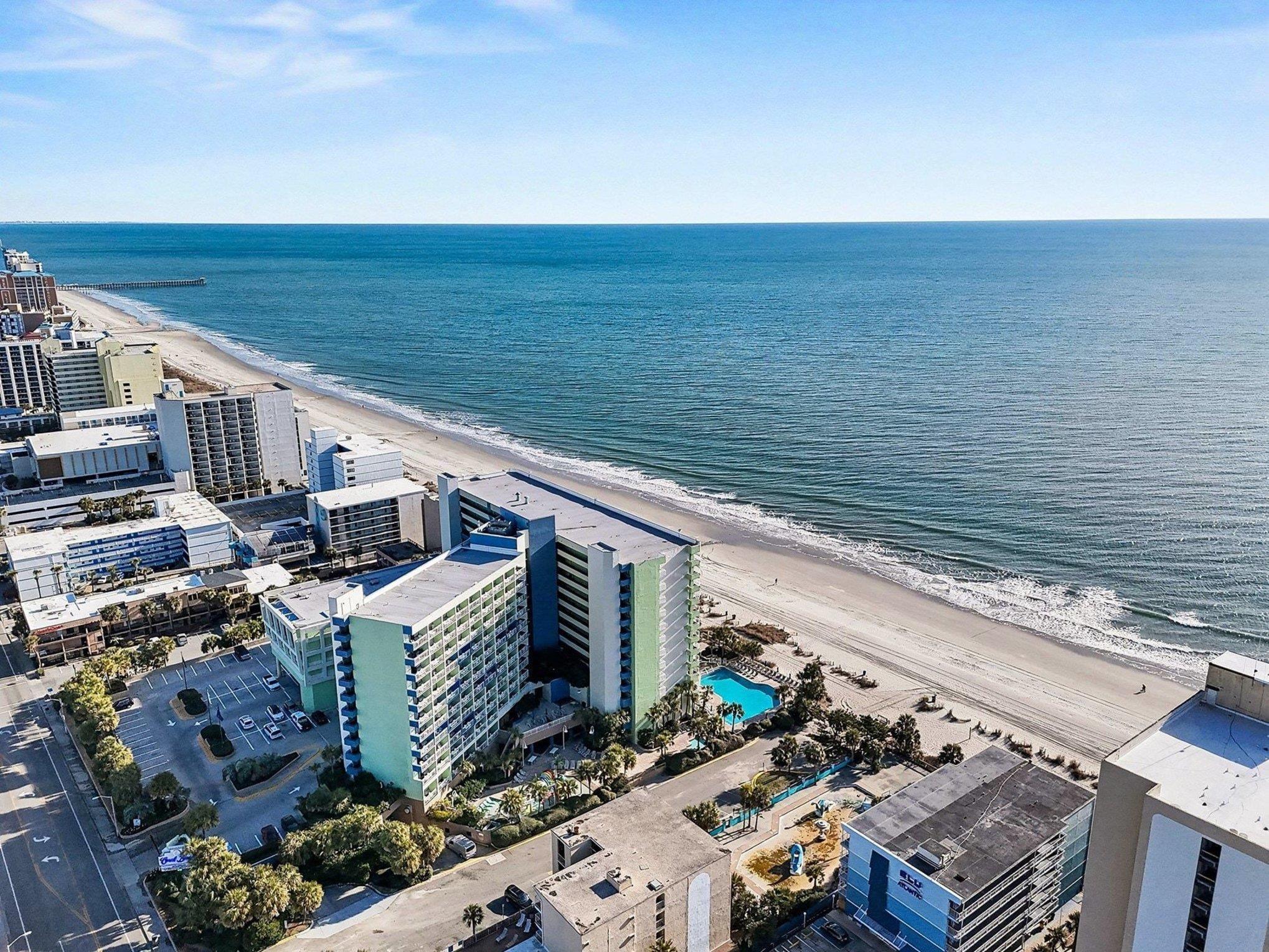 Image 3: View of urban area with expansive beach