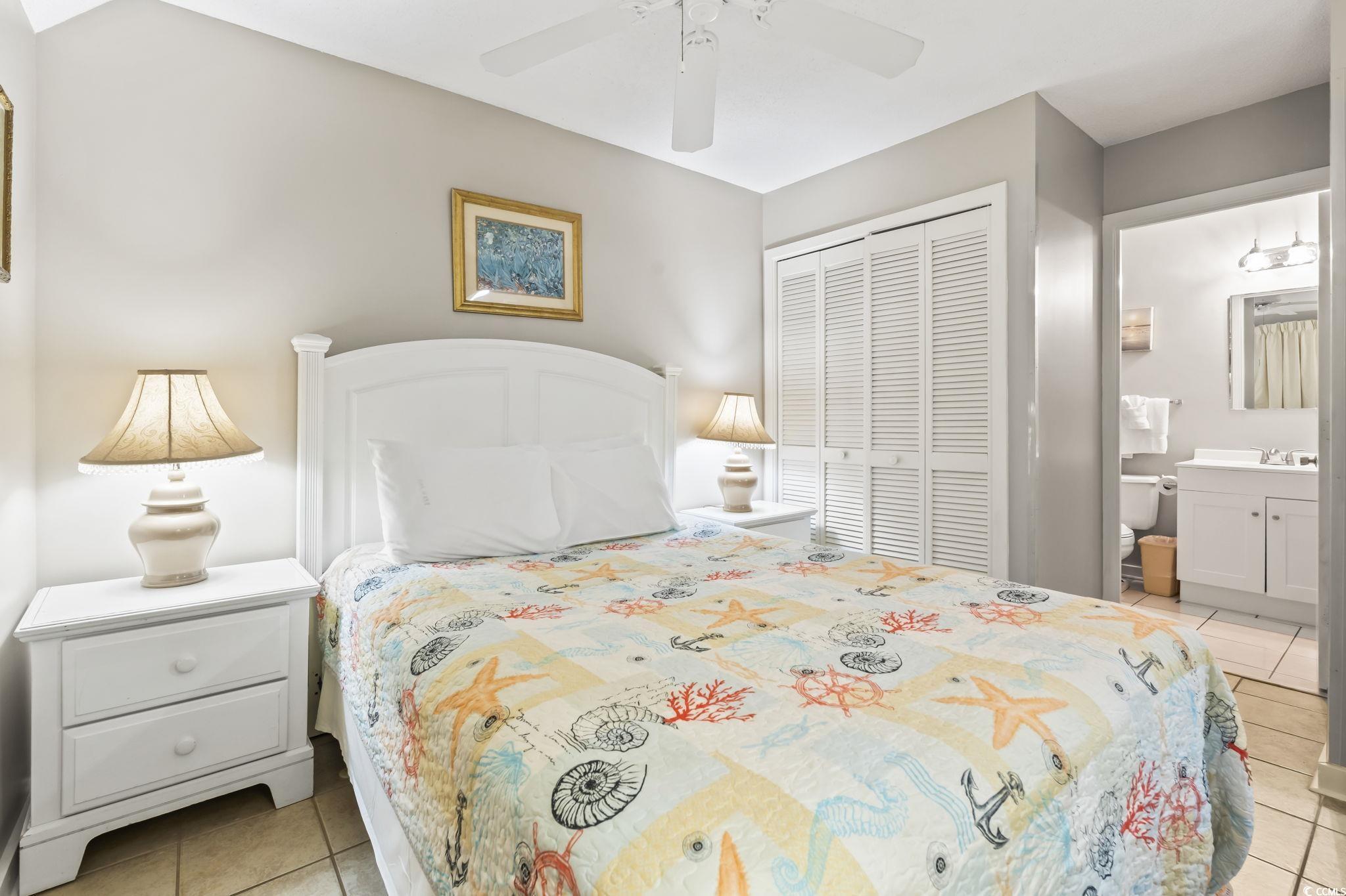Image 4: Bedroom featuring light tile patterned floors, a c Image 4: Bedroom featuring light tile patterned floors, a c