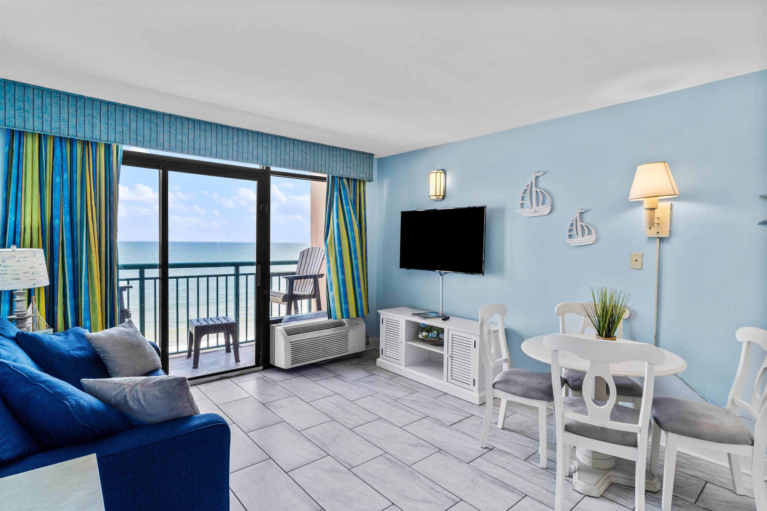 Image 4: Living room featuring an AC wall unit Image 4: Living room featuring an AC wall unit